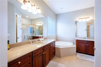 Immaculately maintained pool home which overlooks the lake on a on Lely Resort Golf and Country Club in Florida - for sale on GolfHomes.com, golf home, golf lot