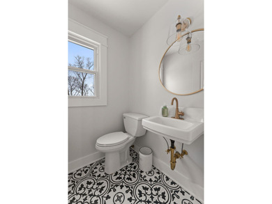 Located on a quiet cul-de-sac, this stunning & BEAUTIFULLY on Lakes of the Four Seasons Country Club in Indiana - for sale on GolfHomes.com, golf home, golf lot