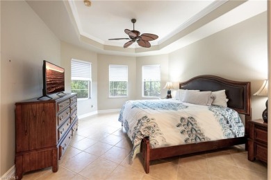 Immaculately maintained pool home which overlooks the lake on a on Lely Resort Golf and Country Club in Florida - for sale on GolfHomes.com, golf home, golf lot