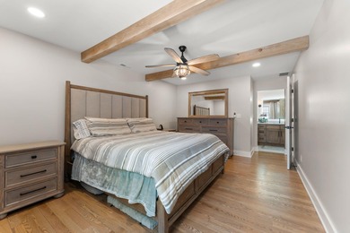 Located on a quiet cul-de-sac, this stunning & BEAUTIFULLY on Lakes of the Four Seasons Country Club in Indiana - for sale on GolfHomes.com, golf home, golf lot