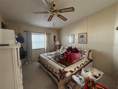 Welcome to Zellwood Station! This 2-bedroom, 2-bath home boasts on Zellwood Station Country Club in Florida - for sale on GolfHomes.com, golf home, golf lot