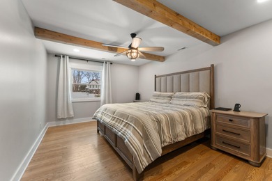 Located on a quiet cul-de-sac, this stunning & BEAUTIFULLY on Lakes of the Four Seasons Country Club in Indiana - for sale on GolfHomes.com, golf home, golf lot