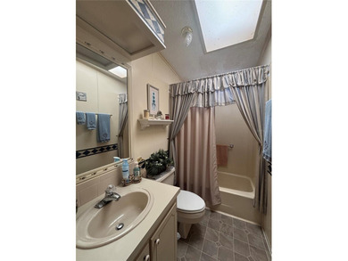 Welcome to Zellwood Station! This 2-bedroom, 2-bath home boasts on Zellwood Station Country Club in Florida - for sale on GolfHomes.com, golf home, golf lot