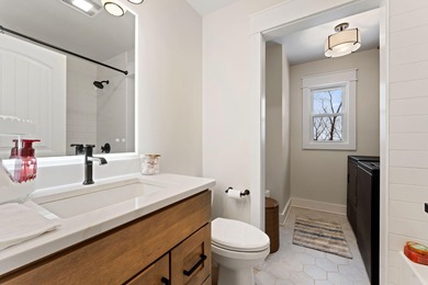 Located on a quiet cul-de-sac, this stunning & BEAUTIFULLY on Lakes of the Four Seasons Country Club in Indiana - for sale on GolfHomes.com, golf home, golf lot