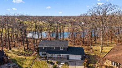 Located on a quiet cul-de-sac, this stunning & BEAUTIFULLY on Lakes of the Four Seasons Country Club in Indiana - for sale on GolfHomes.com, golf home, golf lot