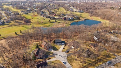 Located on a quiet cul-de-sac, this stunning & BEAUTIFULLY on Lakes of the Four Seasons Country Club in Indiana - for sale on GolfHomes.com, golf home, golf lot
