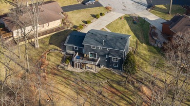 Located on a quiet cul-de-sac, this stunning & BEAUTIFULLY on Lakes of the Four Seasons Country Club in Indiana - for sale on GolfHomes.com, golf home, golf lot