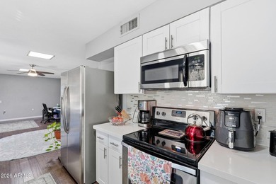 Located in the heart of Sun City, residents enjoy access to 7 on Sun City Lakes West and East in Arizona - for sale on GolfHomes.com, golf home, golf lot