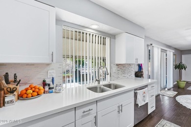 Located in the heart of Sun City, residents enjoy access to 7 on Sun City Lakes West and East in Arizona - for sale on GolfHomes.com, golf home, golf lot