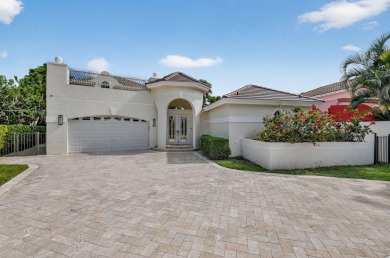 Refined Luxury in this Light Filled Courtyard Estate l Rare on Boca Delray Golf and Country Club in Florida - for sale on GolfHomes.com, golf home, golf lot
