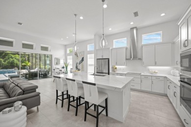 STUNNING HOME WITH POOL AND SPA IN THE CONSERVATORY AT HAMMOCK on Conservatory Course At Hammock Beach Resort in Florida - for sale on GolfHomes.com, golf home, golf lot