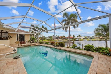PRICED TO SELL! BURNT STORE ISLES! BEAUTIFUL 3 BEDROOM, 2 BATH on Twin Isles Country Club in Florida - for sale on GolfHomes.com, golf home, golf lot