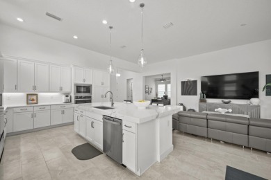 STUNNING HOME WITH POOL AND SPA IN THE CONSERVATORY AT HAMMOCK on Conservatory Course At Hammock Beach Resort in Florida - for sale on GolfHomes.com, golf home, golf lot