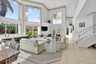 Refined Luxury in this Light Filled Courtyard Estate l Rare on Boca Delray Golf and Country Club in Florida - for sale on GolfHomes.com, golf home, golf lot