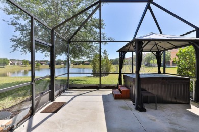 Beautiful Lakefront home in Halifax Plantation features an open on Halifax Plantation Golf Club in Florida - for sale on GolfHomes.com, golf home, golf lot