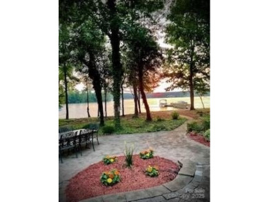 Fabulous lakefront home featuring incredible sunrise views of on Old North State Club at Uwharrie Point Golf community in North Carolina - for sale on GolfHomes.com, golf home, golf lot