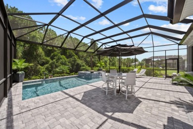 STUNNING HOME WITH POOL AND SPA IN THE CONSERVATORY AT HAMMOCK on Conservatory Course At Hammock Beach Resort in Florida - for sale on GolfHomes.com, golf home, golf lot