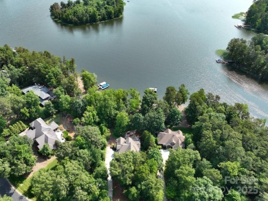Fabulous lakefront home featuring incredible sunrise views of on Old North State Club at Uwharrie Point Golf community in North Carolina - for sale on GolfHomes.com, golf home, golf lot