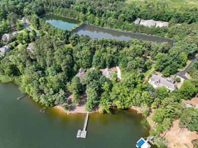 Fabulous lakefront home featuring incredible sunrise views of on Old North State Club at Uwharrie Point Golf community in North Carolina - for sale on GolfHomes.com, golf home, golf lot