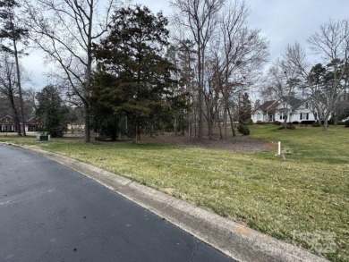 Great building site adjacent to the 9th fairway of the Old North on Old North State Club at Uwharrie Point Golf community in North Carolina - for sale on GolfHomes.com, golf home, golf lot
