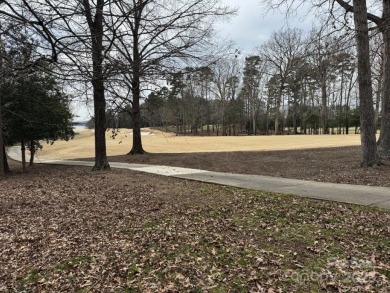 Great building site adjacent to the 9th fairway of the Old North on Old North State Club at Uwharrie Point Golf community in North Carolina - for sale on GolfHomes.com, golf home, golf lot
