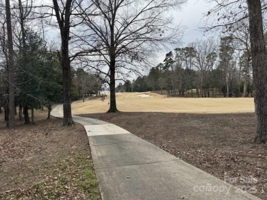 Great building site adjacent to the 9th fairway of the Old North on Old North State Club at Uwharrie Point Golf community in North Carolina - for sale on GolfHomes.com, golf home, golf lot