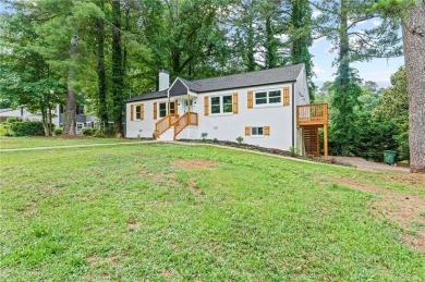 It's hard to miss this fully renovated, 4 side brick beauty on Alfred Tup Holmes Golf Course in Georgia - for sale on GolfHomes.com, golf home, golf lot