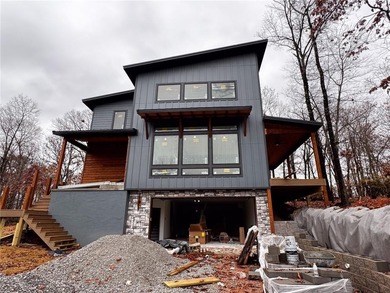 Striking contemporary new build with estimated completion on Branchwood Golf Course in Arkansas - for sale on GolfHomes.com, golf home, golf lot