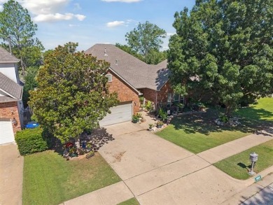 Enjoy the sunset from the back patio overlooking the 18th hole on Battle Creek Golf Course in Oklahoma - for sale on GolfHomes.com, golf home, golf lot