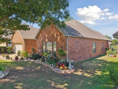 Enjoy the sunset from the back patio overlooking the 18th hole on Battle Creek Golf Course in Oklahoma - for sale on GolfHomes.com, golf home, golf lot