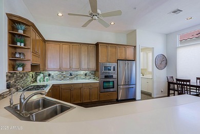 This stunning Edmunds home sits on a superior south facing golf on Legend Trail Golf Club in Arizona - for sale on GolfHomes.com, golf home, golf lot