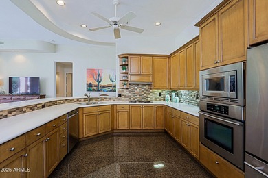 This stunning Edmunds home sits on a superior south facing golf on Legend Trail Golf Club in Arizona - for sale on GolfHomes.com, golf home, golf lot