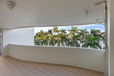 Grab your slice of paradise in this immaculate Bahia Vista condo on Isla Del Sol Yacht and Country Club in Florida - for sale on GolfHomes.com, golf home, golf lot