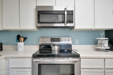 Don't miss this beautifully furnished 3-bedroom, 2-bath condo on Oak Island Golf Club in North Carolina - for sale on GolfHomes.com, golf home, golf lot