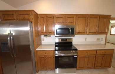 Golf Lover's dream! This spacious 3-sided brick home has plenty on Briarbrook Golf Course in Missouri - for sale on GolfHomes.com, golf home, golf lot