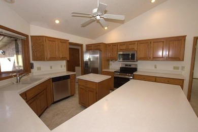 Golf Lover's dream! This spacious 3-sided brick home has plenty on Briarbrook Golf Course in Missouri - for sale on GolfHomes.com, golf home, golf lot