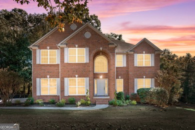 Welcome home to this stunning 3-story brick residence in the on Canongate At Heron Bay in Georgia - for sale on GolfHomes.com, golf home, golf lot