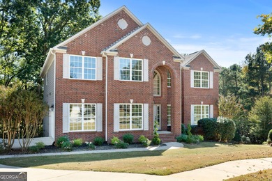 Welcome home to this stunning 3-story brick residence in the on Canongate At Heron Bay in Georgia - for sale on GolfHomes.com, golf home, golf lot