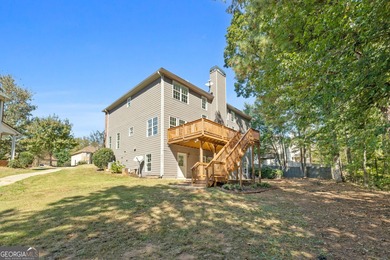 Welcome home to this stunning 3-story brick residence in the on Canongate At Heron Bay in Georgia - for sale on GolfHomes.com, golf home, golf lot