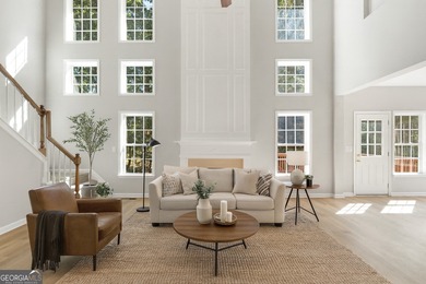 Welcome home to this stunning 3-story brick residence in the on Canongate At Heron Bay in Georgia - for sale on GolfHomes.com, golf home, golf lot