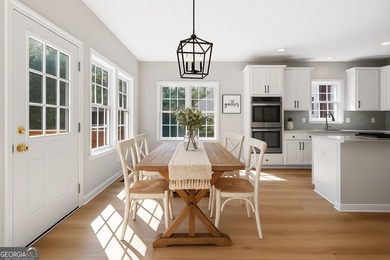 Welcome home to this stunning 3-story brick residence in the on Canongate At Heron Bay in Georgia - for sale on GolfHomes.com, golf home, golf lot
