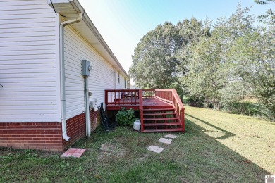 This inviting 3-bedroom, 2-bathroom home offers 1,300+ sqft of on Benton Golf and Country Club in Kentucky - for sale on GolfHomes.com, golf home, golf lot