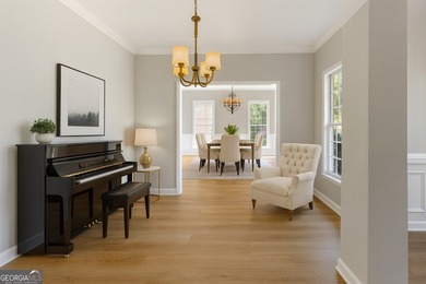 Welcome home to this stunning 3-story brick residence in the on Canongate At Heron Bay in Georgia - for sale on GolfHomes.com, golf home, golf lot
