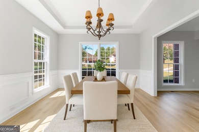 Welcome home to this stunning 3-story brick residence in the on Canongate At Heron Bay in Georgia - for sale on GolfHomes.com, golf home, golf lot
