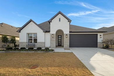 This stunning, light-filled home showcases an open-concept on Wildhorse Golf Club of Robson Ranch in Texas - for sale on GolfHomes.com, golf home, golf lot