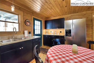 This is the cabin in the woods where you can envision your on Beech Mountain Club in North Carolina - for sale on GolfHomes.com, golf home, golf lot