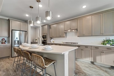 This stunning, light-filled home showcases an open-concept on Wildhorse Golf Club of Robson Ranch in Texas - for sale on GolfHomes.com, golf home, golf lot