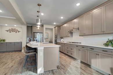 This stunning, light-filled home showcases an open-concept on Wildhorse Golf Club of Robson Ranch in Texas - for sale on GolfHomes.com, golf home, golf lot