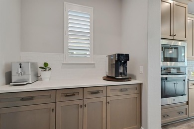 This stunning, light-filled home showcases an open-concept on Wildhorse Golf Club of Robson Ranch in Texas - for sale on GolfHomes.com, golf home, golf lot