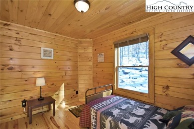 This is the cabin in the woods where you can envision your on Beech Mountain Club in North Carolina - for sale on GolfHomes.com, golf home, golf lot